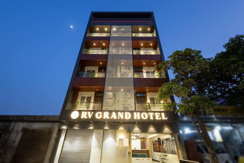 RV Grand Varanasi lit against the evening sky
